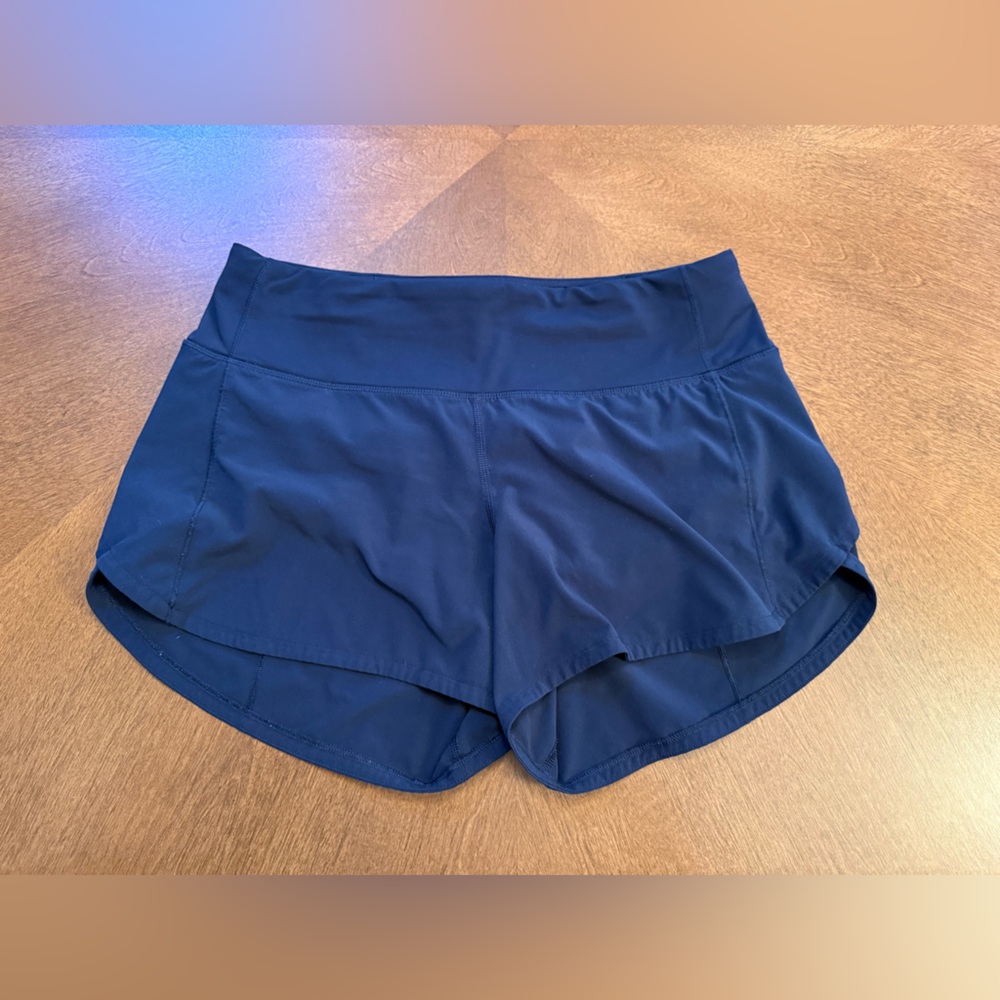 Lululemon Speed Up 4” shorts. Size 6. Navy Blue.